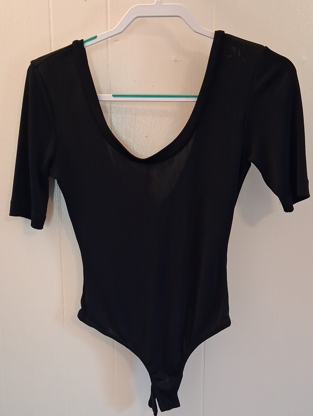 FP Intimately Classic Black Scoop Neck Low Back Slinky Short Sleeve Bodysuit